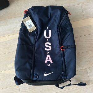 Nike Navy Blue Backpack with Pink Accents